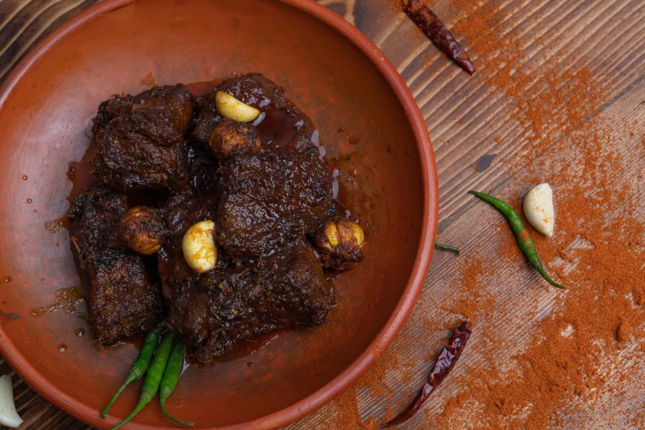 Beef chui jhal with pieces of aromatic pepper stem